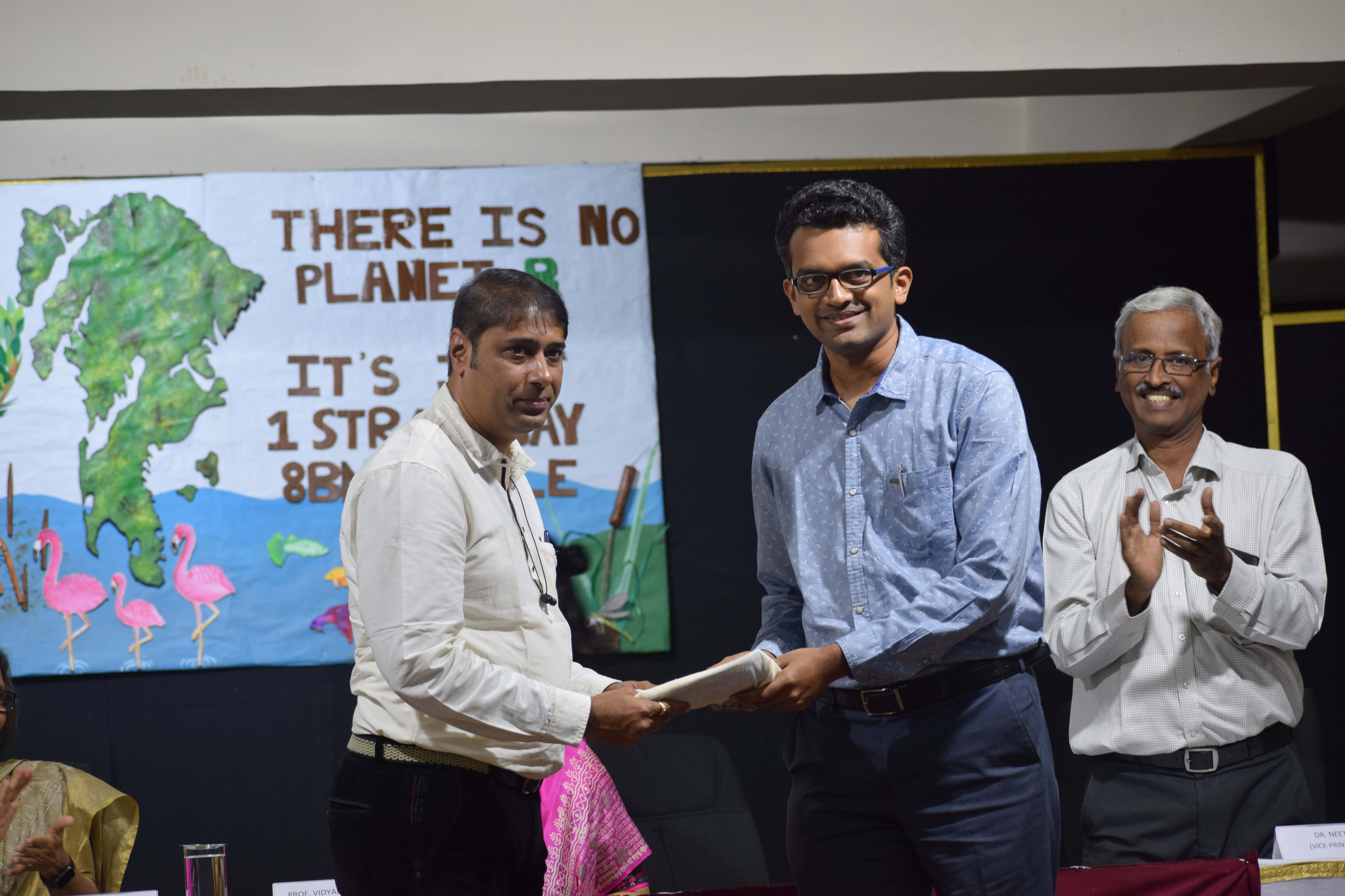 WETLAND AND MANGROVE ACTIVIST MR. NANDKUMAR PAWAR BEING FELICITATED (2).JPG