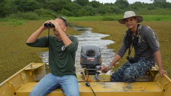 Walter and Tyrique patrol the wetlands at Crooked Tree Wildlife Sanctuary in Belize. The sanctuary is a home for migratory birds who fly south for winter.